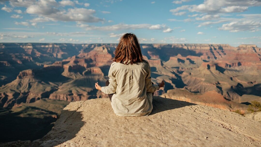 person meditating alone