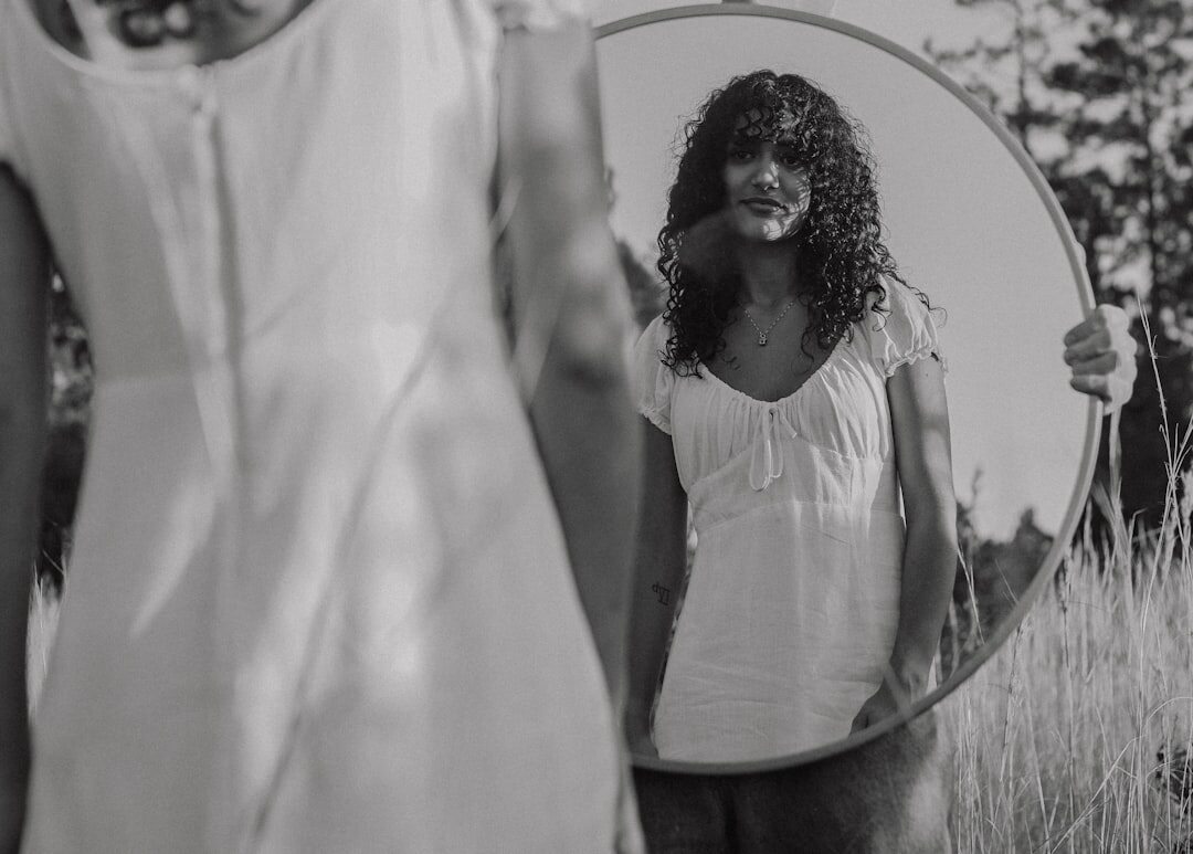 woman practicing speech in mirror
